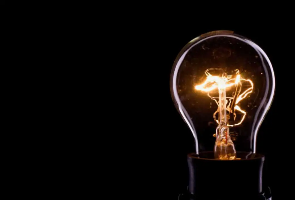 Electricity makes a lightbulb glow