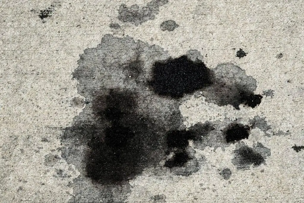 Semi-permanent stain on concrete which could be removed with a concrete cleaner