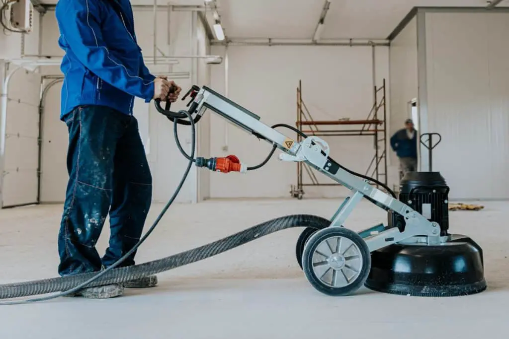 Man polishing concrete floor