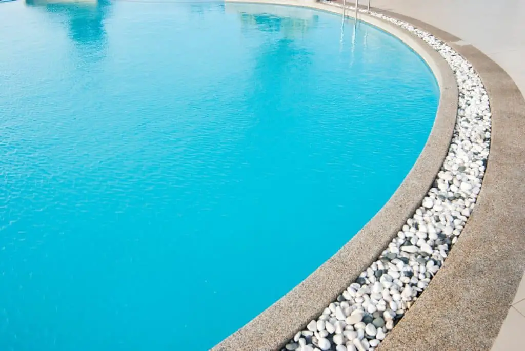 Nice pool decking with concrete and stone combo