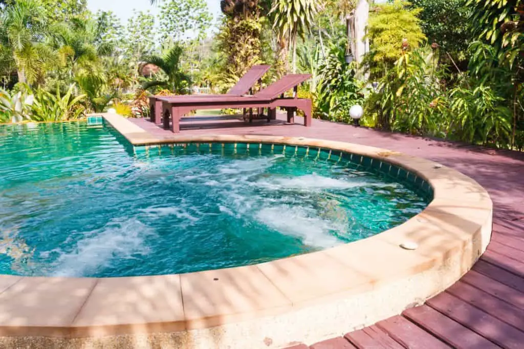 Pool deck with raised precast concrete