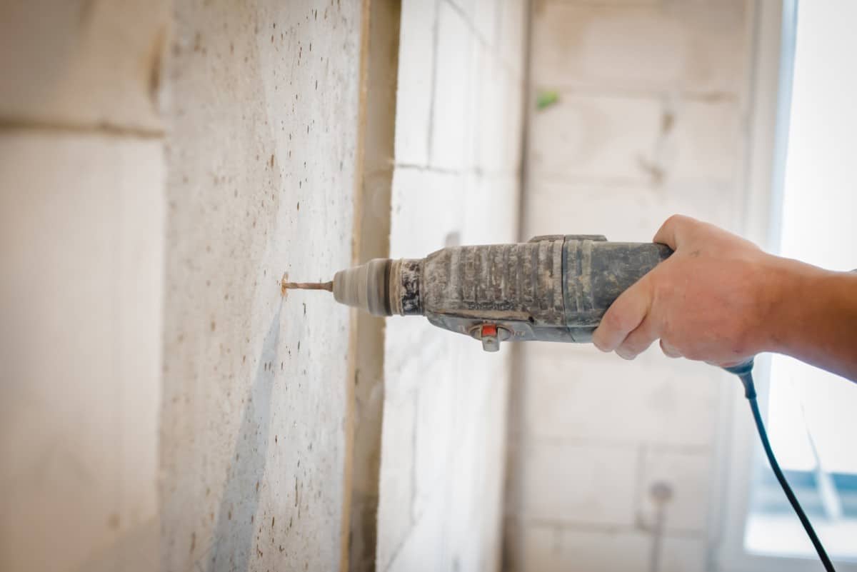 How to Drill Into Concrete (And what drill and bit you need)