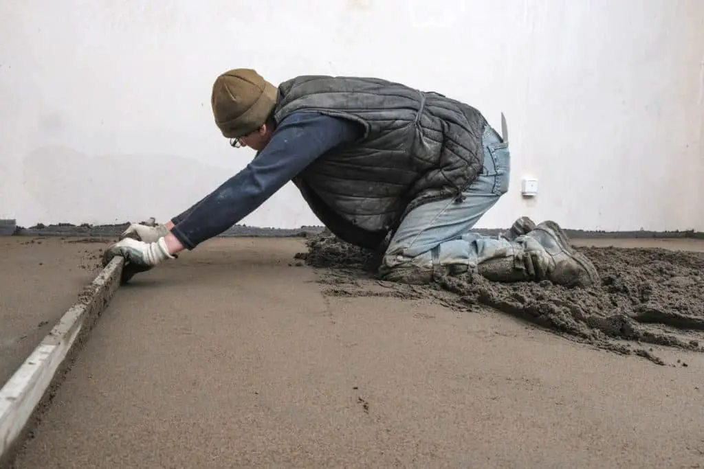 Man making a regular concrete floor