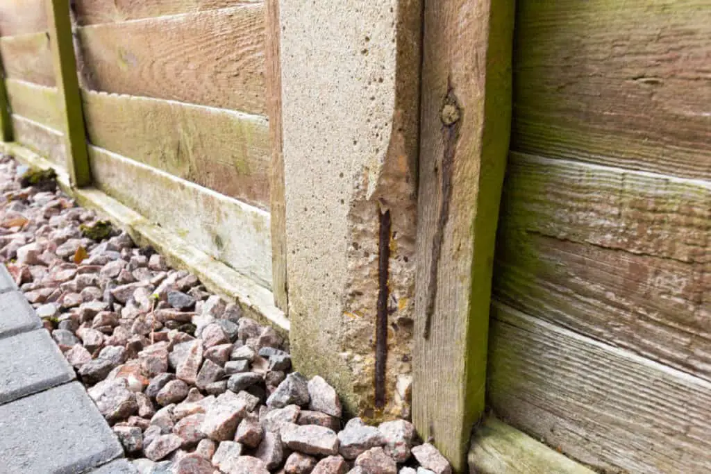 Broken concrete fence post