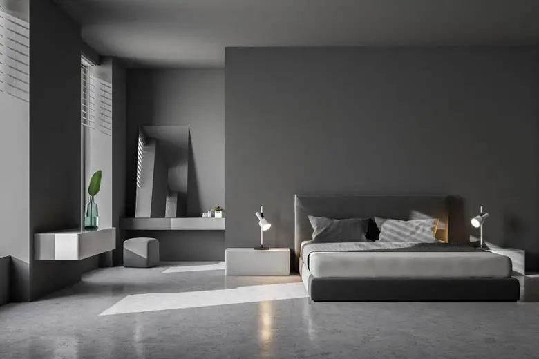 Bedroom with cold concrete slab floor