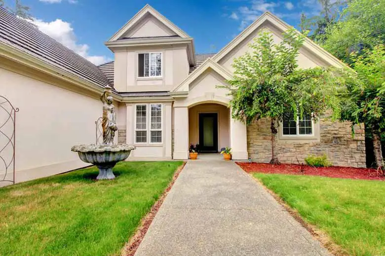 Concrete walkway in front of house