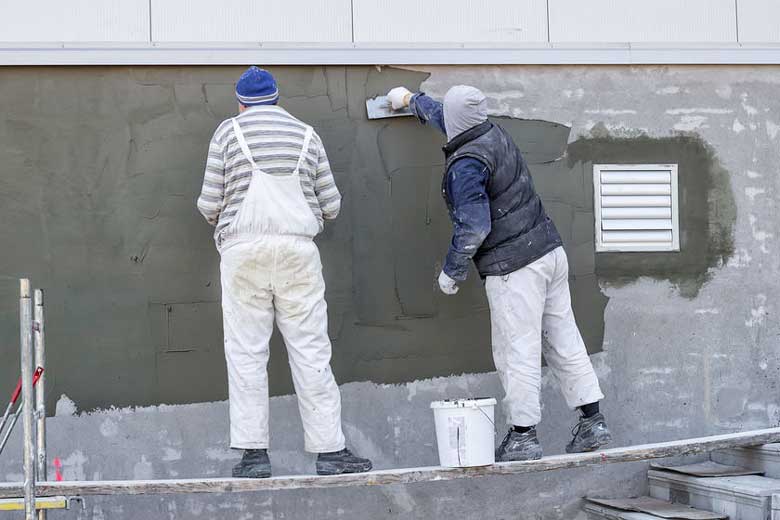 Stucco on concrete wall